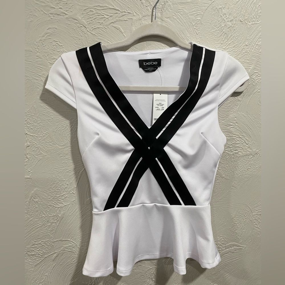 NWT Bebe sailor cap sleeve peplum top size extra small